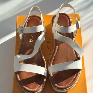 Cute Unisa sandals. Lots of life left in these.